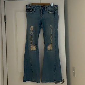 Ripped/patchwork detail flared jeans SZ 9/10